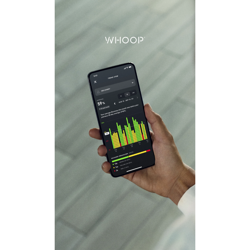 A hand holding a smartphone displaying WHOOP app with a green and yellow bar chart, set against a soft gray background with the brand name WHOOP above - Bikers.SG