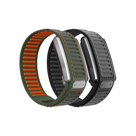 Two rugged WHOOP Navigator OEM replacement bands shown on a white background, one in olive green with orange stitching and one in dark gray with black stitching - Bikers.SG