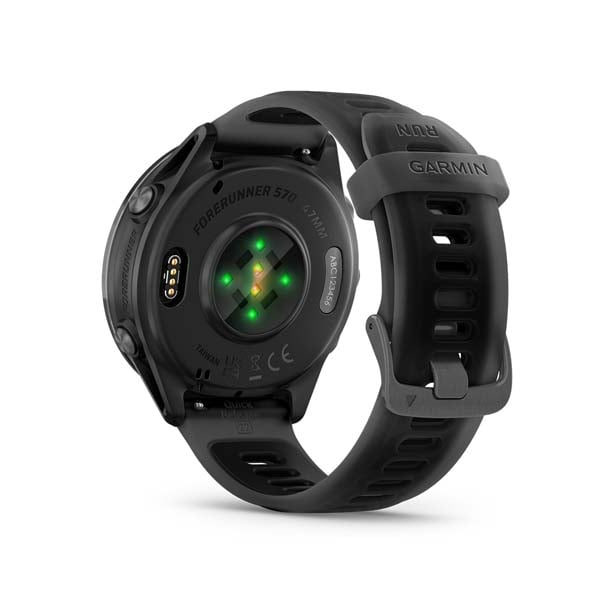 Garmin Forerunner 570 47 mm, Slate Gray with Translucent Black and Black band, rear view showing sensor and charging contacts